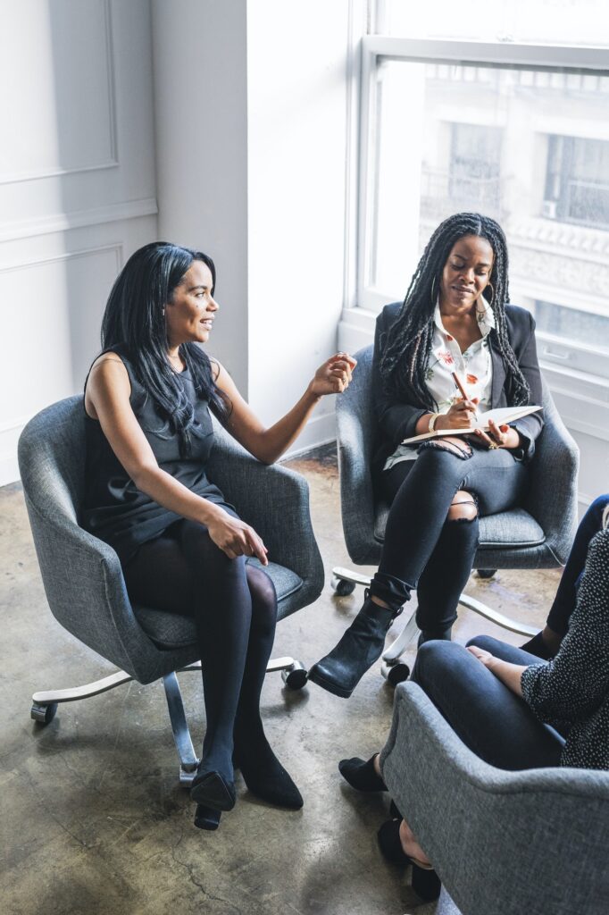 Professional businesswomen talking